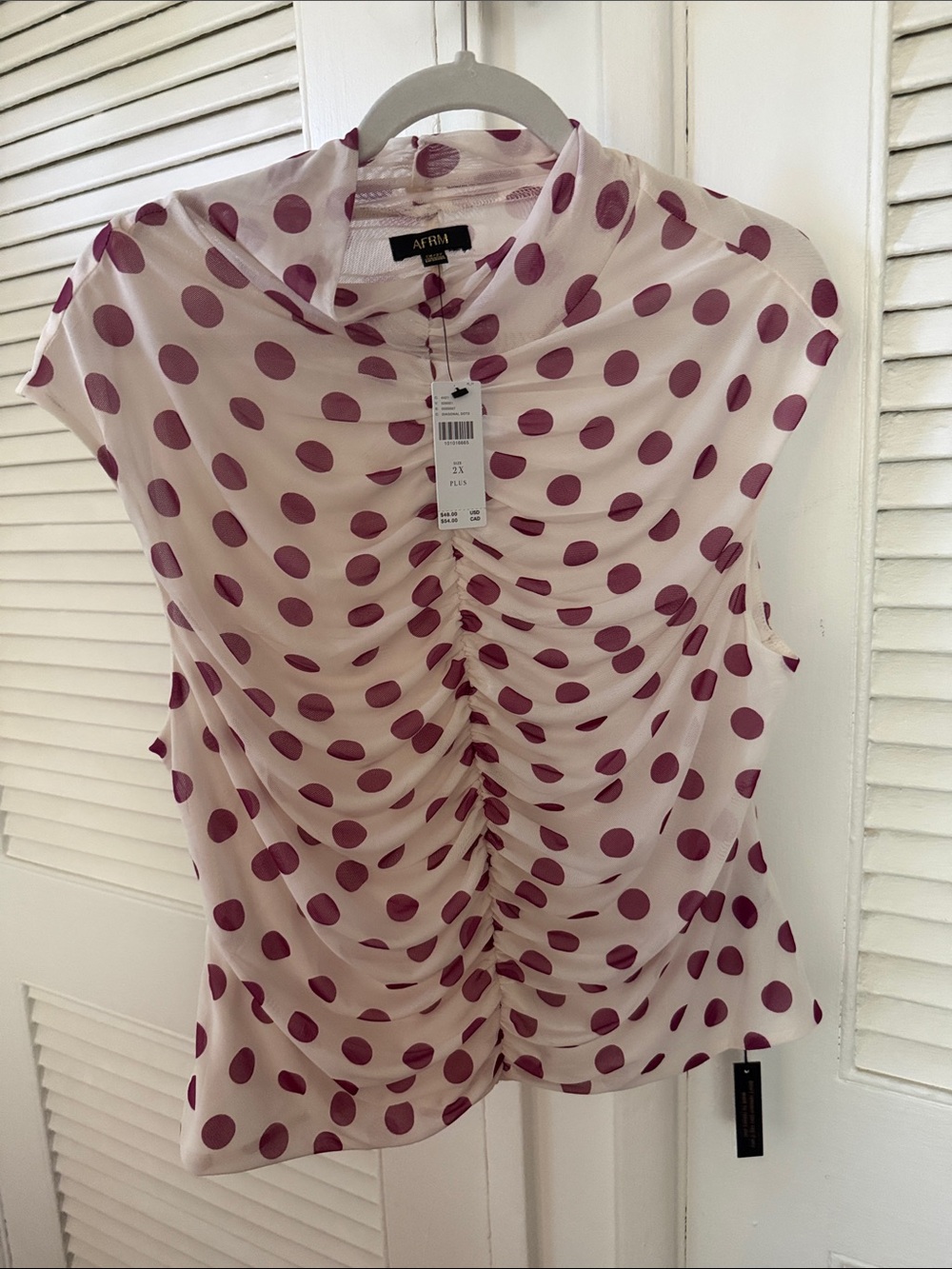 Anthropologie Cream Sleeveless Blouse with Plum Polka Dots